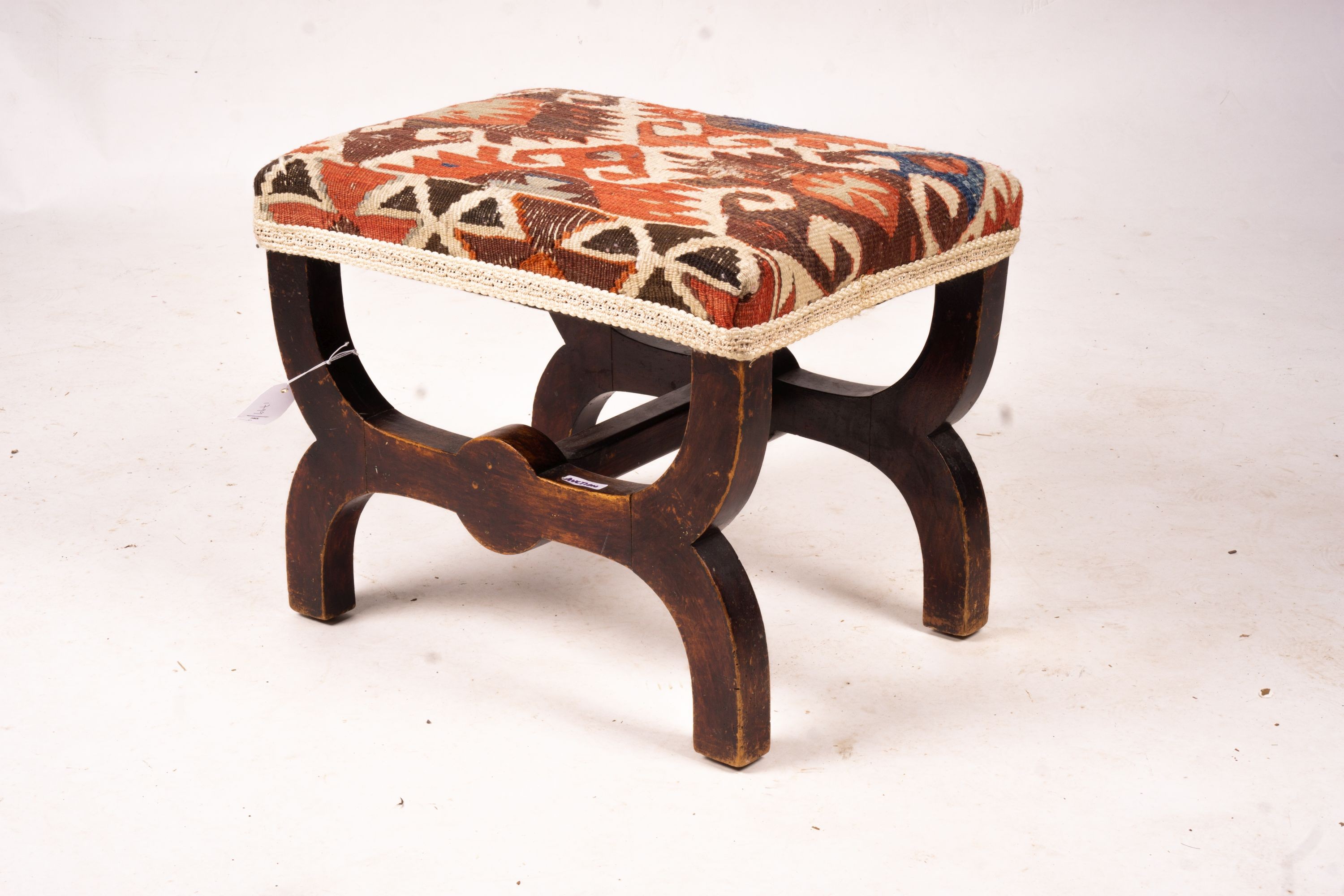 A Victorian beech 'X' framed stool with Kelim seat, length 48cm, depth 35cm, height 37cm